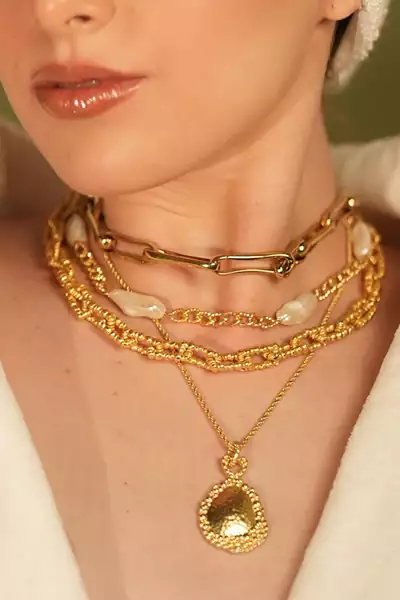 Gold finished riverstone pendant necklace