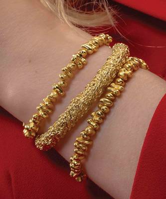 Gold finished dune bangles 2