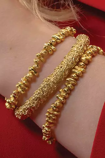 Gold finished dune bangles