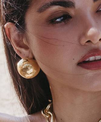 Gold finished globe studs 1
