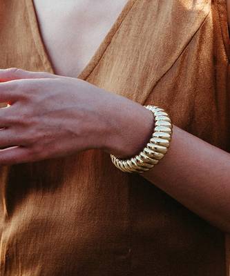 Gold finished twisted tide cuff 1