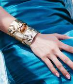 Gold tiger’s eye power cuff