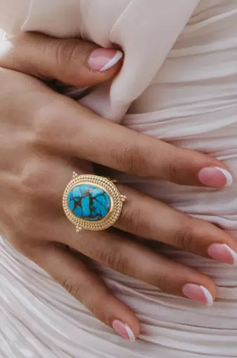 Turquoise emblem ring for women