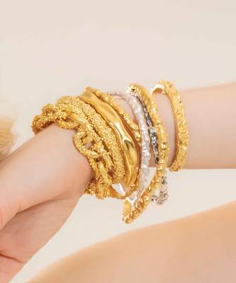 Gold sun-kissed open bangle 1