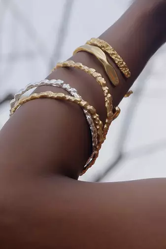 Gold finished sand bangle for women