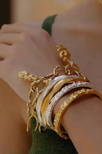 Gold finished sand bangle for women