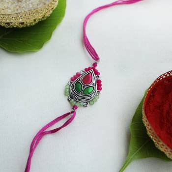 Regal blossom vivid vintage rakhi with roli chawal 1
