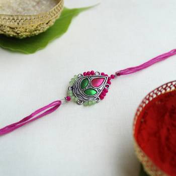 Regal blossom vivid vintage rakhi with roli chawal 3