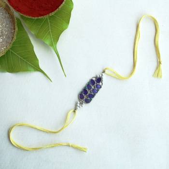 Purple petal vivid vintage rakhi with roli chawal 1