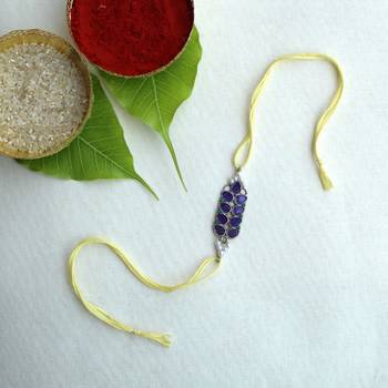 Purple petal vivid vintage rakhi with roli chawal 2