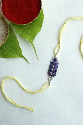 Purple petal vivid vintage rakhi with roli chawal