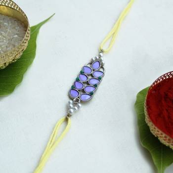 Purple petal vivid vintage rakhi with roli chawal 3