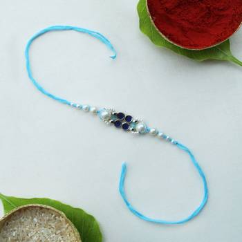 Azure pearl vivid vintage rakhi with roli chawal 1