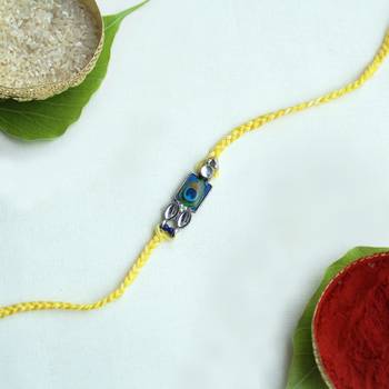 Mor pankh vivid vintage rakhi with roli chawal 1