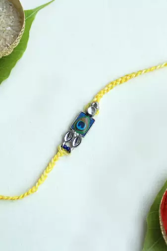 Mor pankh vivid vintage rakhi with roli chawal