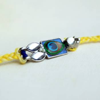 Mor pankh vivid vintage rakhi with roli chawal 2
