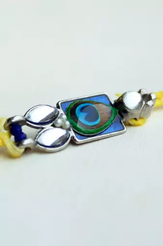 Mor pankh vivid vintage rakhi with roli chawal