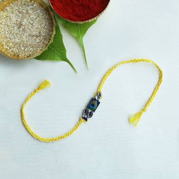 Mor pankh vivid vintage rakhi with roli chawal 3