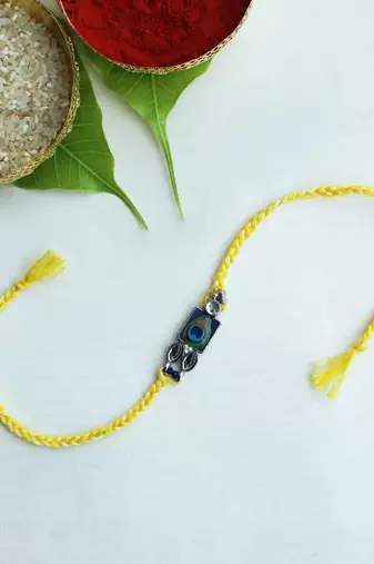 Mor pankh vivid vintage rakhi with roli chawal