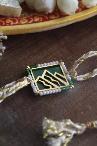 Mountain calling beaded  rakhi with roli chawal