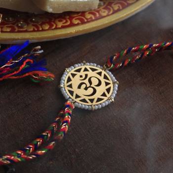 golden beaded om rakhi with roli chawal 1