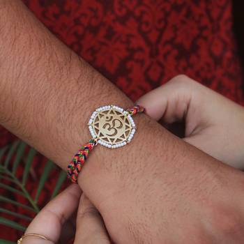 golden beaded om rakhi with roli chawal 4