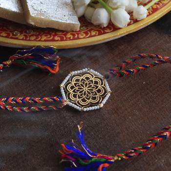Golden beaded mandala rakhi with roli chawal 1