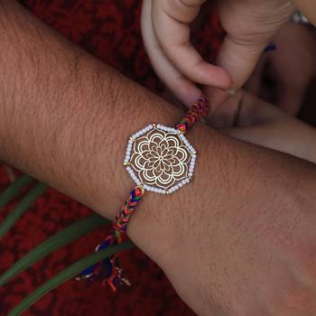 Golden beaded mandala rakhi with roli chawal 3