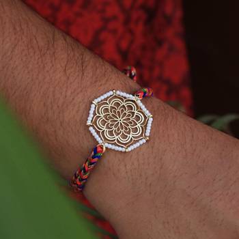 Golden beaded mandala rakhi with roli chawal 4