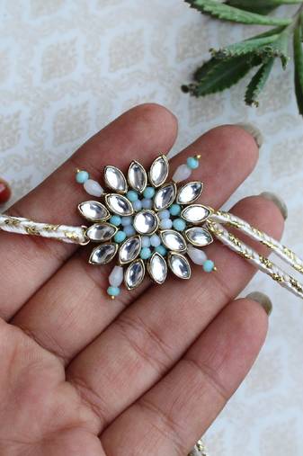 Blossoming kundan and bead work rakhi with roli chawal