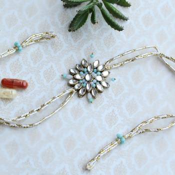 Blossoming kundan and bead work rakhi with roli chawal 2