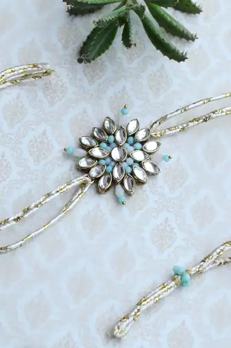 Blossoming kundan and bead work rakhi with roli chawal