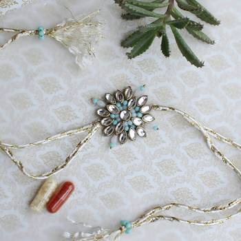 Blossoming kundan and bead work rakhi with roli chawal 3