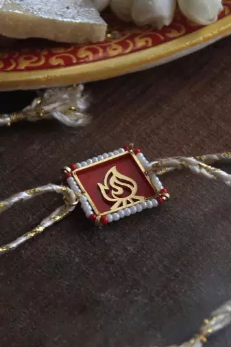 Fearless beaded rakhi with roli chawal