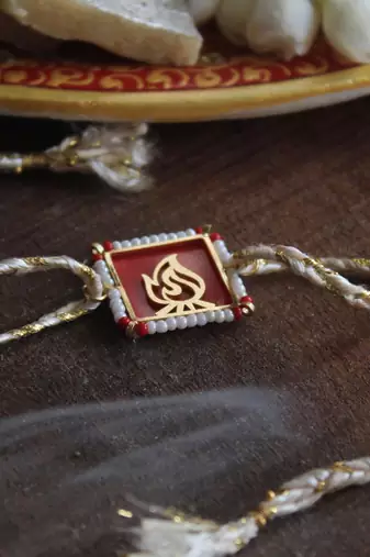 Fearless beaded rakhi with roli chawal