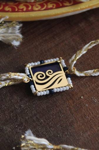 Lively beaded rakhi with roli chawal