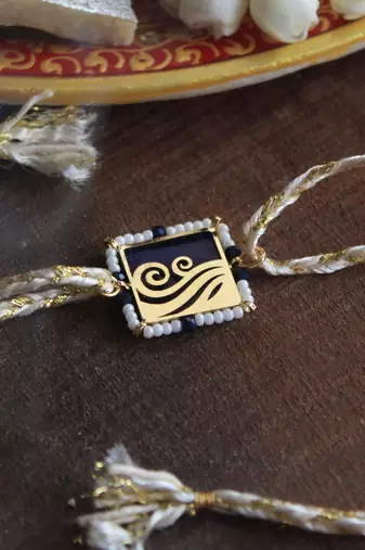Lively beaded rakhi with roli chawal