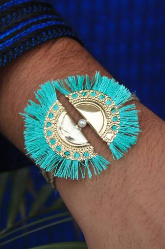 Aqua tassel rakhi with roli chawal