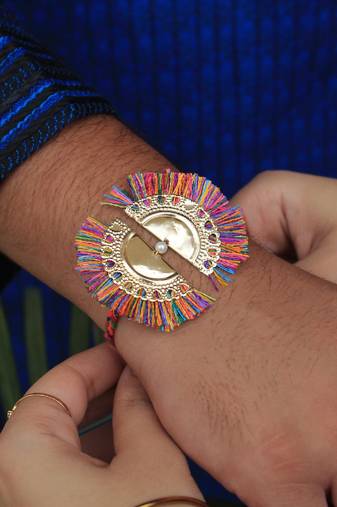 Multicolour tassel rakhi with roli chawal