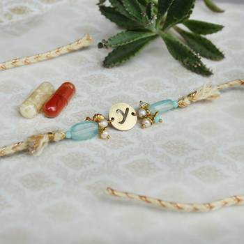 Shades of sea green stones personalised rakhi with roli chawal 3