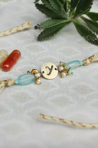 Shades of sea green stones personalised rakhi with roli chawal