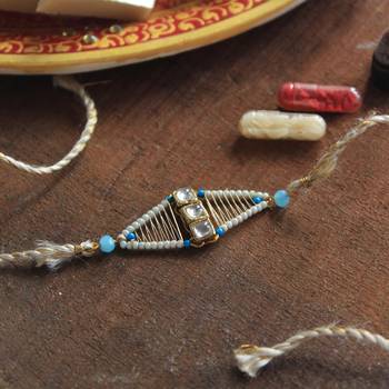 Kundan encased rakhi with roli chawal 1