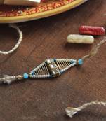 Kundan encased rakhi with roli chawal