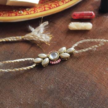 Elegance redefined rakhi with roli chawal 1