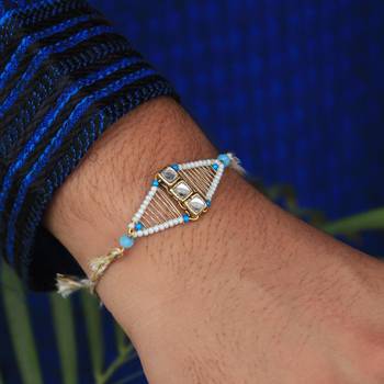 Kundan encased rakhi with roli chawal 2
