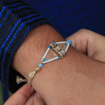 Kundan encased rakhi with roli chawal 3