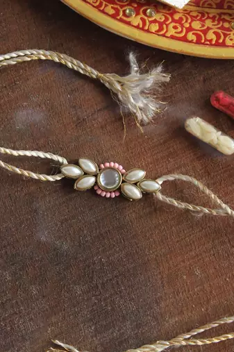 Elegance redefined rakhi with roli chawal
