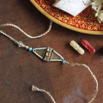 Kundan encased rakhi with roli chawal 4