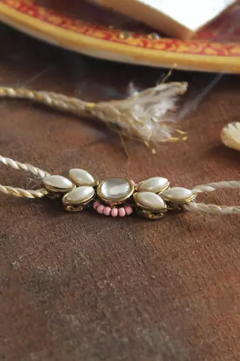 Elegance redefined rakhi with roli chawal