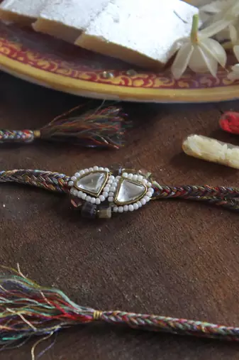 Trillion kundan and bead rakhi with roli chawal